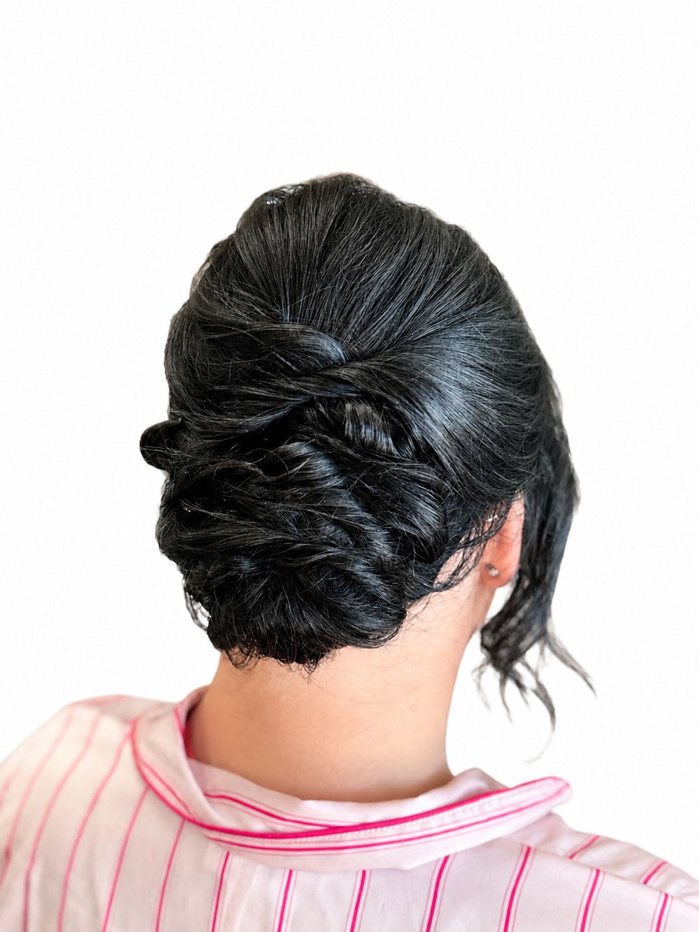Sleek twisted updo hairstyling by Aubree at Blonde Faith in Carrollton, Georgia